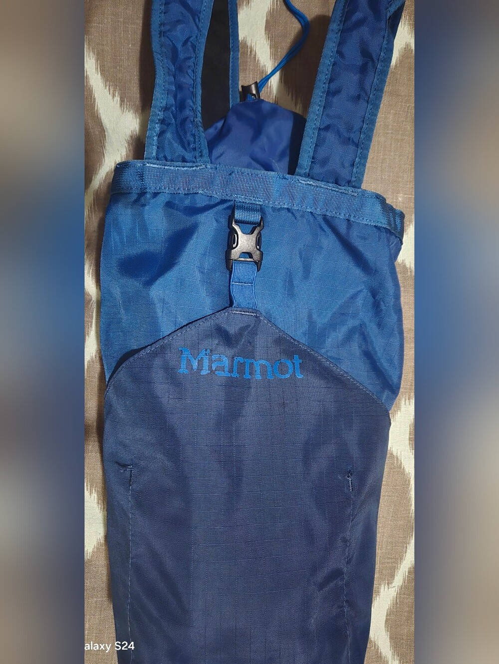 Marmot  BACKPACK. Colbalt Blue, outsude Pocket, Pull String Closure & Clasp Lock